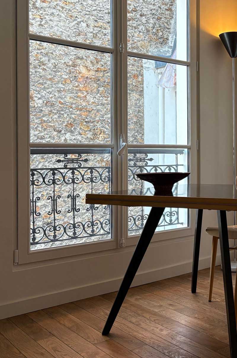 Architecte d'intérieur Paris 11e - espace chambre du studio rénové